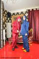 Miss Francine and Lady Nadja in AGU rainwear handcuff and ballgag each other