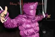 Sandra tied, gagged and hooded complete overhead with ropes and a clothgag wearing a sexy purple down jacket and a rain pant (Pics)