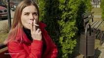 Kate is answering the questions while smoking 120mm in the street