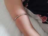 Tight small rings around Janes soft upper arms