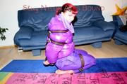 Jill tied and gagged with webbing load restraint assembly on the floor wearing a sexy purple down jacket and a rain pants (Pics)