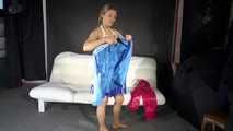 Watching sexy Sandra dressing her up with a new red shiny nylon rain pants and a blue rain jacket lolling, posing and enjoying herself in this cloth (Video)