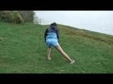 Enni during stretching wearing shiny nylon shorts and an oldschool rain jacket (Video)