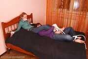 Catt and Alexa - Naughty girl tied up before joining helpless girlfriend on the bed