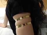 Golden upper arm rings