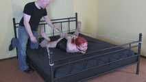 Jessy defenseless on the bed