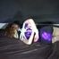 Red haired Woman bound and gagged in a shiny purple wetlook Dress