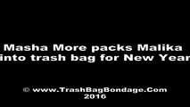 [From archive] Masha More & Malika - Masha More packs Malika into trash bag for new year (video)