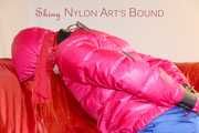 Sonja tied and gagged on a bar wearing a sexy blue shiny nylon rain pants and a pink down jacket (Pics)