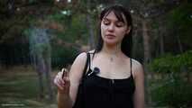 Smoking 120mm cigarette outdoors