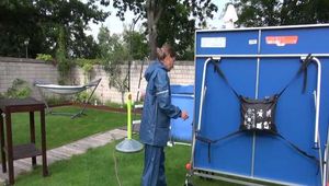 Watch Sandra playing Table Tennis in her oldschool Rainsuit