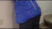 Jill tied, gagged and hooded in a stairway with cuffs wearing a sexy blue PAMY jacket and a rain pants (Video)