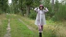 Miss Petra takes a walk in an AGU rain suit, transparent rainsuit and rubber boots (looped version)