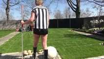 Watching Pia sweeping the terrace wearing a sexy black shiny nylon shorts, a striped top and black rubber boots (Video)