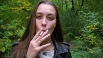 Cute smoker Ksenia enjoys her walk with a cigarette 