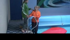 Being with Katharina and Jenny in the swimming pool both wearing supersexy rainwear (Video)
