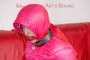 Sonja tied and gagged on a bar wearing a sexy blue shiny nylon rain pants and a pink down jacket (Pics)