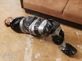 [From archive] Iren packed in trash bag (3)