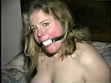 30 Yr OLD BBW SINGLE MOM IS TIED NAKED ON THE BED, 2 DIFFERENT BALL-GAGS, TAPE GAGGED, BARE FEET TIED, TOE TIED, LARGE RAG STUFFED IN MOUTH & TIED IN WITH ROPE (D58-8)