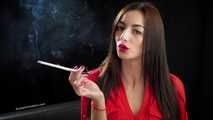 Gorgeous maneater Marina is smoking a 120mm with a short cigarette holder