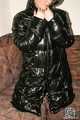 Kim in shiny black Pamy coat