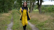 Miss Petra goes for a walk in friesennerz, yellow rain dungarees and rubber boots