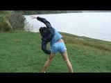 Enni during stretching wearing shiny nylon shorts and an oldschool rain jacket (Video)