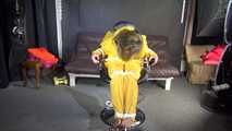 Sandra being tied and gagged on a hairdresser´s chair wearing sexy yellow shiny nylon rainwear being double hooded (Video)