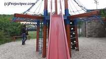 078090 Rachel Evans Takes A Very Naughty Pee In the Play Park