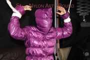 Sandra tied, gagged and hooded complete overhead with ropes and a clothgag wearing a sexy purple down jacket and a rain pant (Pics)