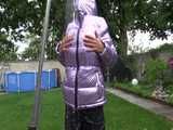 Watch Sandra taking a shower in her new purple shiny nylon down jacket 