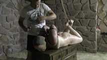 Hogtied and whipped