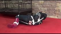 Jill tied, gagged and hooded lying on the floor wearing sexy shiny nylon black rainwear (Video)
