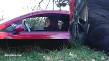 Mistress Cleo smokes and smashes balls with a car CBT A picture in a picture version
