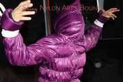 Sandra tied, gagged and hooded complete overhead with ropes and a clothgag wearing a sexy purple down jacket and a rain pant (Pics)