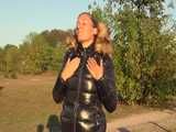 Watch Sandra enjoying her shiny nylon Downjacket at very warm Wearther outside