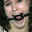 ERICA IS RING GAGGED, MOUTH STUFFED, CLEAVE GAGGED & TIED WITH BLACK NYLON ROPE (D36-10)