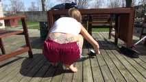 Watching sexy SANDRA wearing a supersexy special red shiny nylon shorts and a white top sweeping the terrace in the SUN enjoying the shiny weather (Video)