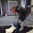 Watch Sandra cleaning the Studio wearing shiny nylon Rainwear and white Rubberboots