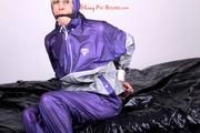 Pia bound and gagged on bed in a shiny purple/silver PVC sauna suit (Pics)