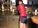 Jill tied and gagged on a pillar in a pub wearing a black shiny nylon shorts (Video)