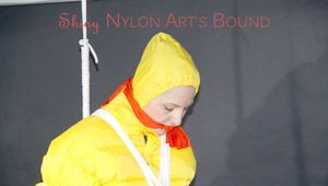 MARA tied and gagged overhead with ropes and a ballgag wearing a super sexy super shiny black rain pants, rubber boots and a yellow down jacket (Pics)