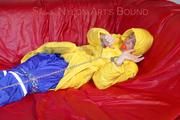 Sonja tied, gagged and hooded on a sofa wearing a sexy blue rain pants and a yellow downwear jacket (Pics)