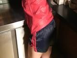 Jill tied and gagged on a pillar in a pub wearing a black shiny nylon shorts (Video)