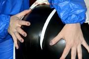 Sophie tied and gagged by Jill wearing a shiny black/white PVC combination (Pics)