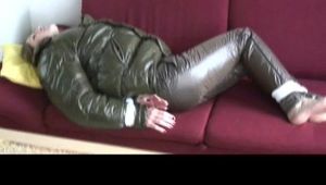 03:50 Min. video with Katharina tied and gagged in shiny downpants and downjacket
