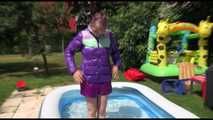 Watching Mara wearing a supersexy purple down skirt and a purple down jacket cleaning the swimming pool and playing with water (Video)