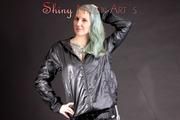 Mara wearing a sexy black shiny nylon shorts and a black rain jacket posing for you (Pics)