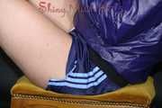 Watching sexy Pia in a sexy oldschool blue shiny nylon shorts and a special rain jacket posing for you on a little chair (Pics)