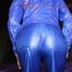 Watching Sandra in sexy blue shiny nylon raver pants and a jacket lolling and posing in front of a mirror (Pics)